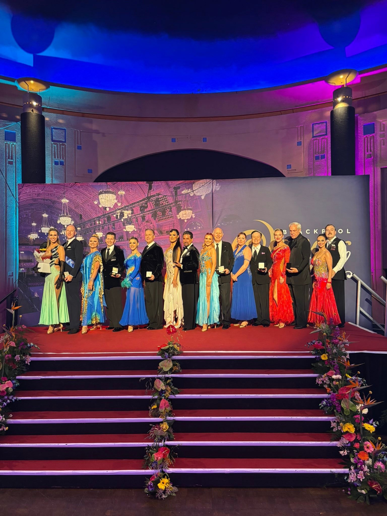 Ballroom competitors line up on the Blackpool awards stage