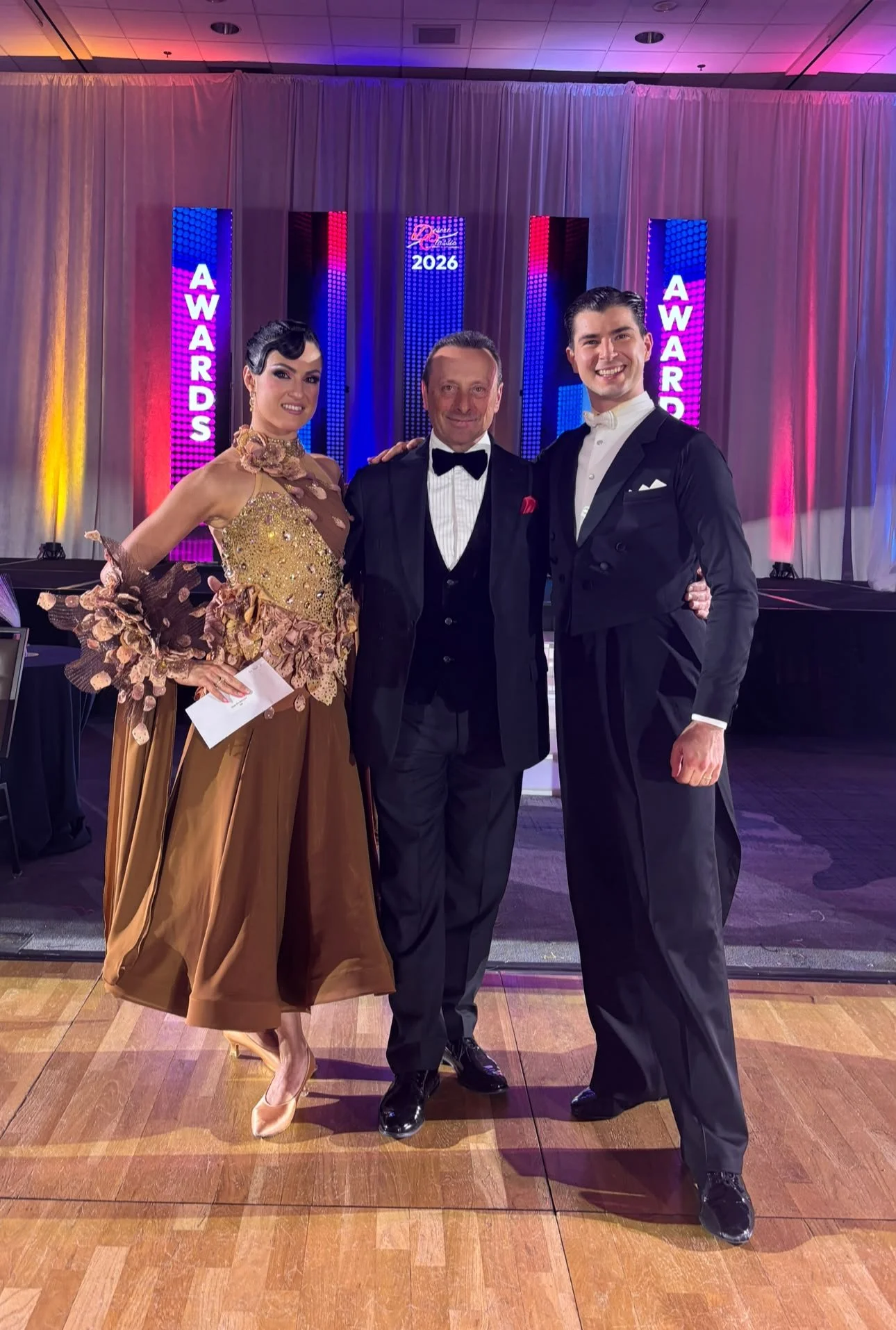 Florin and Natalia pose with fellow dancers at Desert Classic