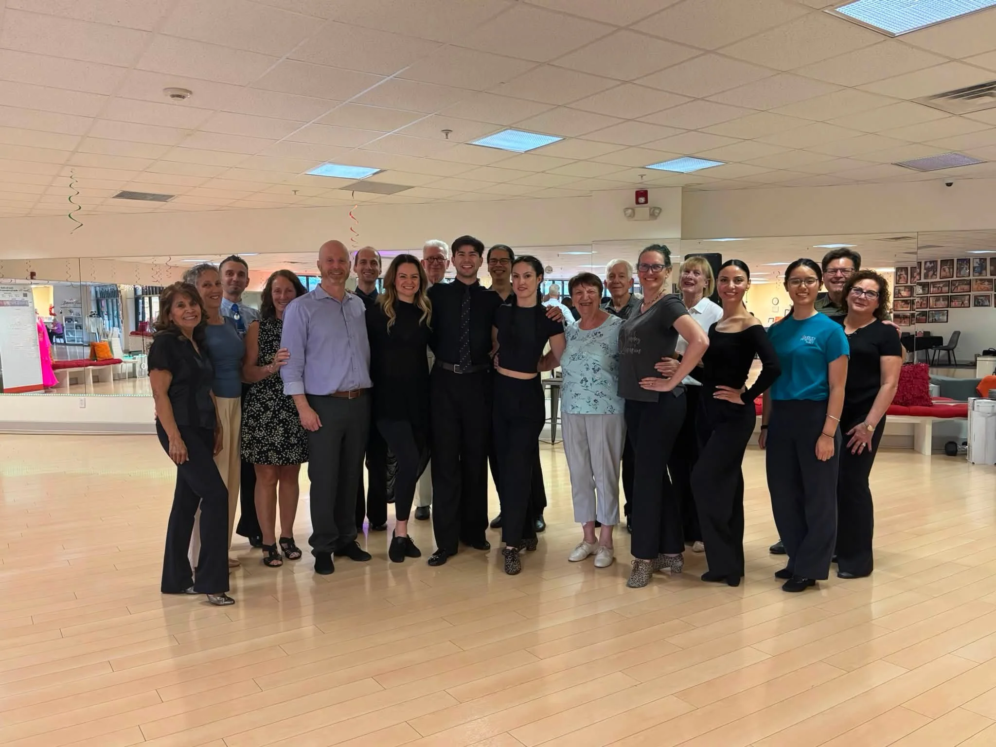 Dance Fire’s coaching participants gather for a group photo with Alexandra Perzhu