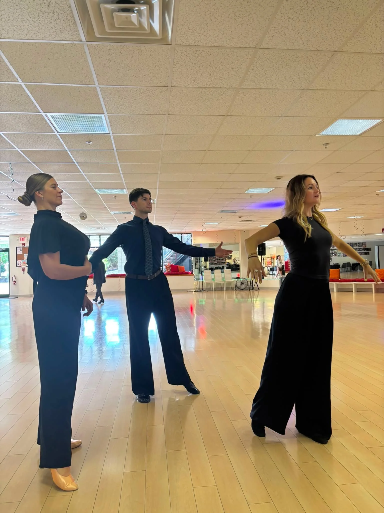 Coaching participants work on an extended arm connection