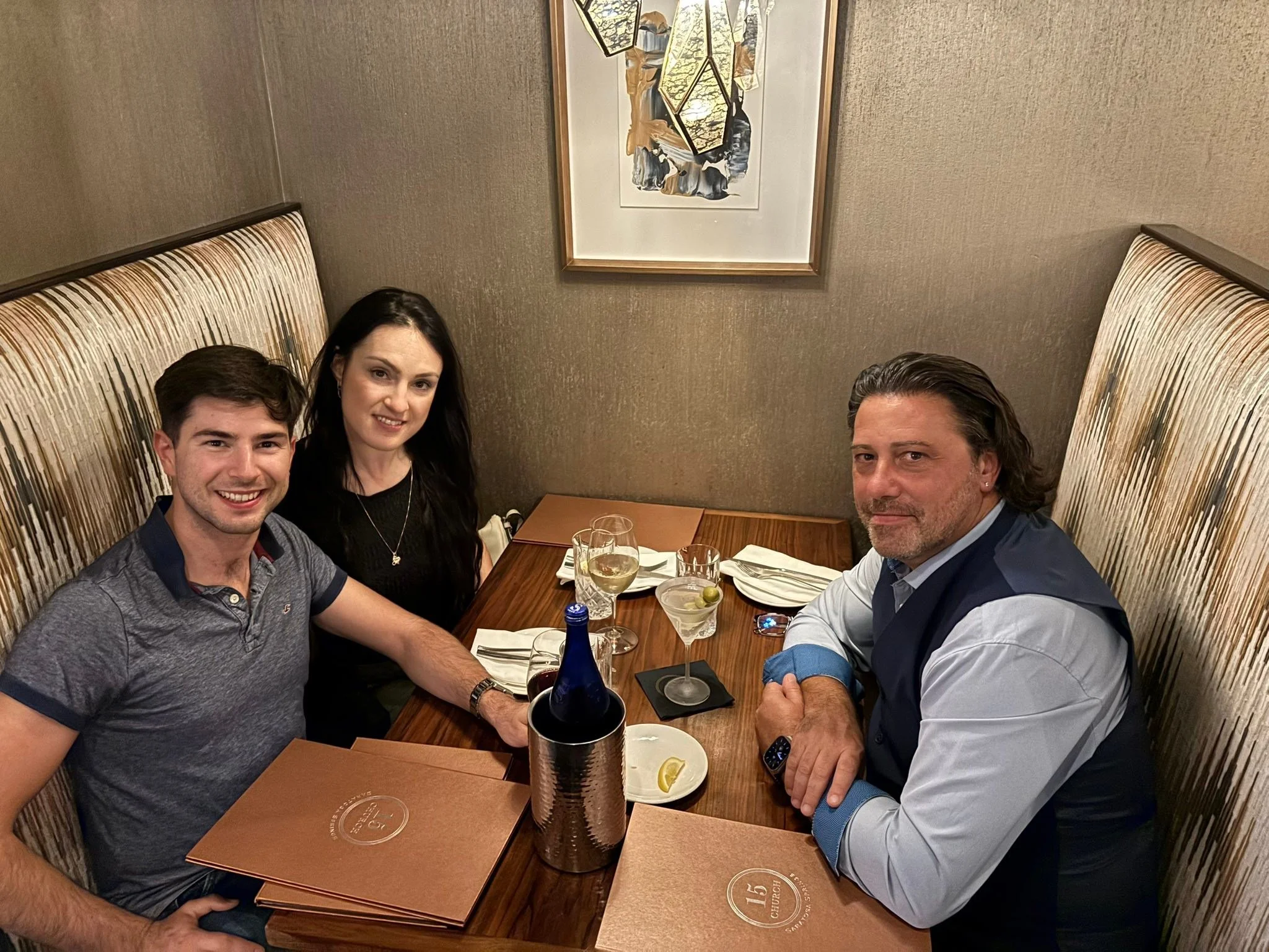 Dance Fire team members share a meal during Francesco Flumiani’s coaching visit