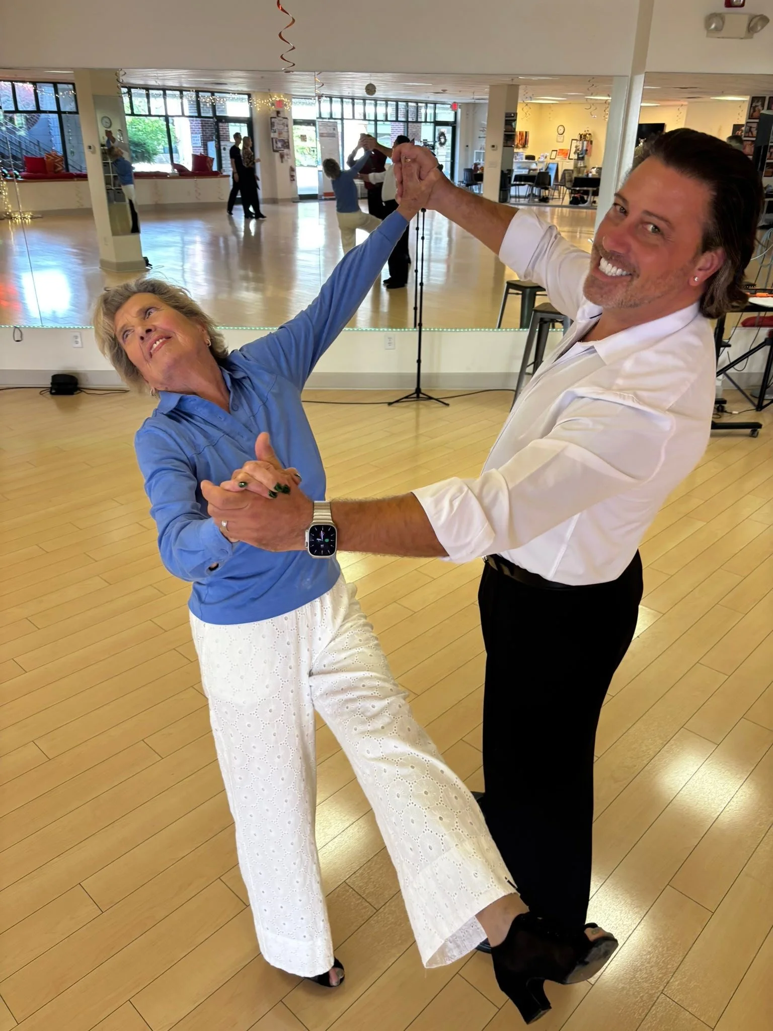 A dancer works on partnering during the guest-coaching visit at Dance Fire