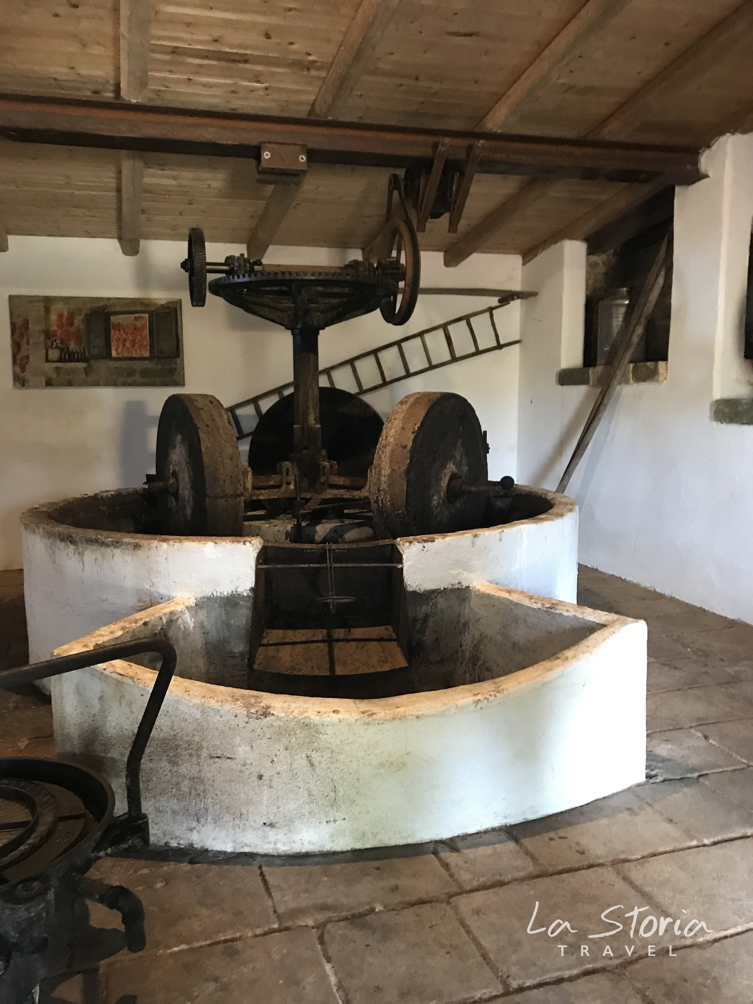 LaStoria_Watermark_Le Stanzie Olive Oil Press.jpg