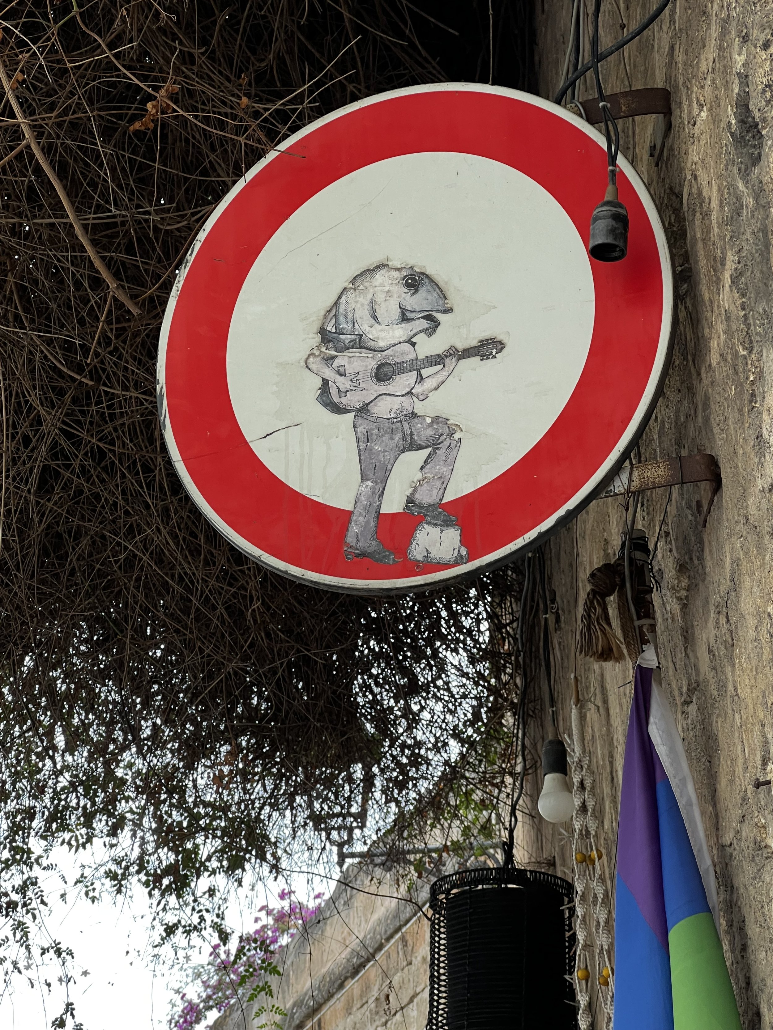 sign with fish grottaglie street art.jpeg