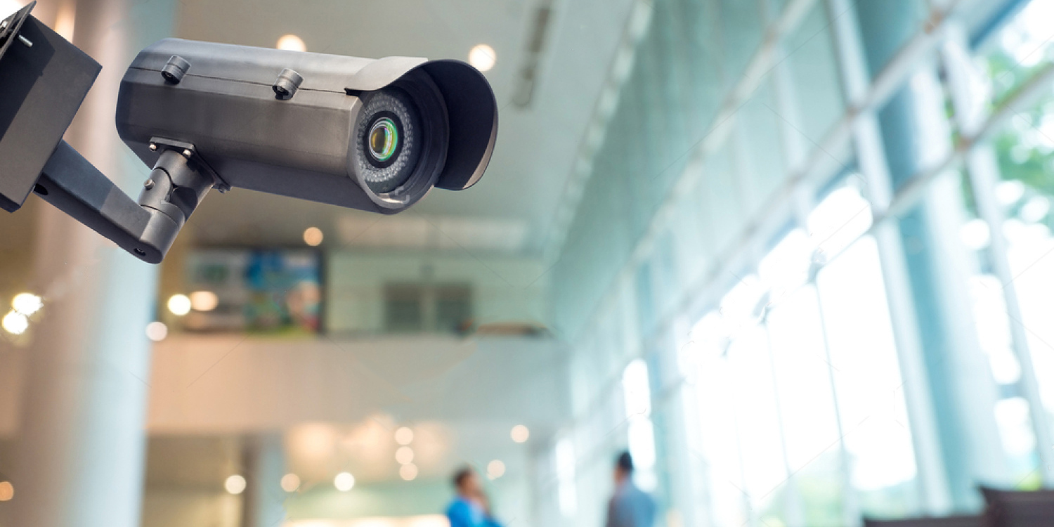 stock-photo-security-cctv-camera-or-surveillance-system-in-office-building-360214781.jpg