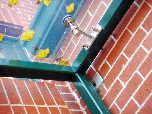 7. glass canopy corner detail.jpg