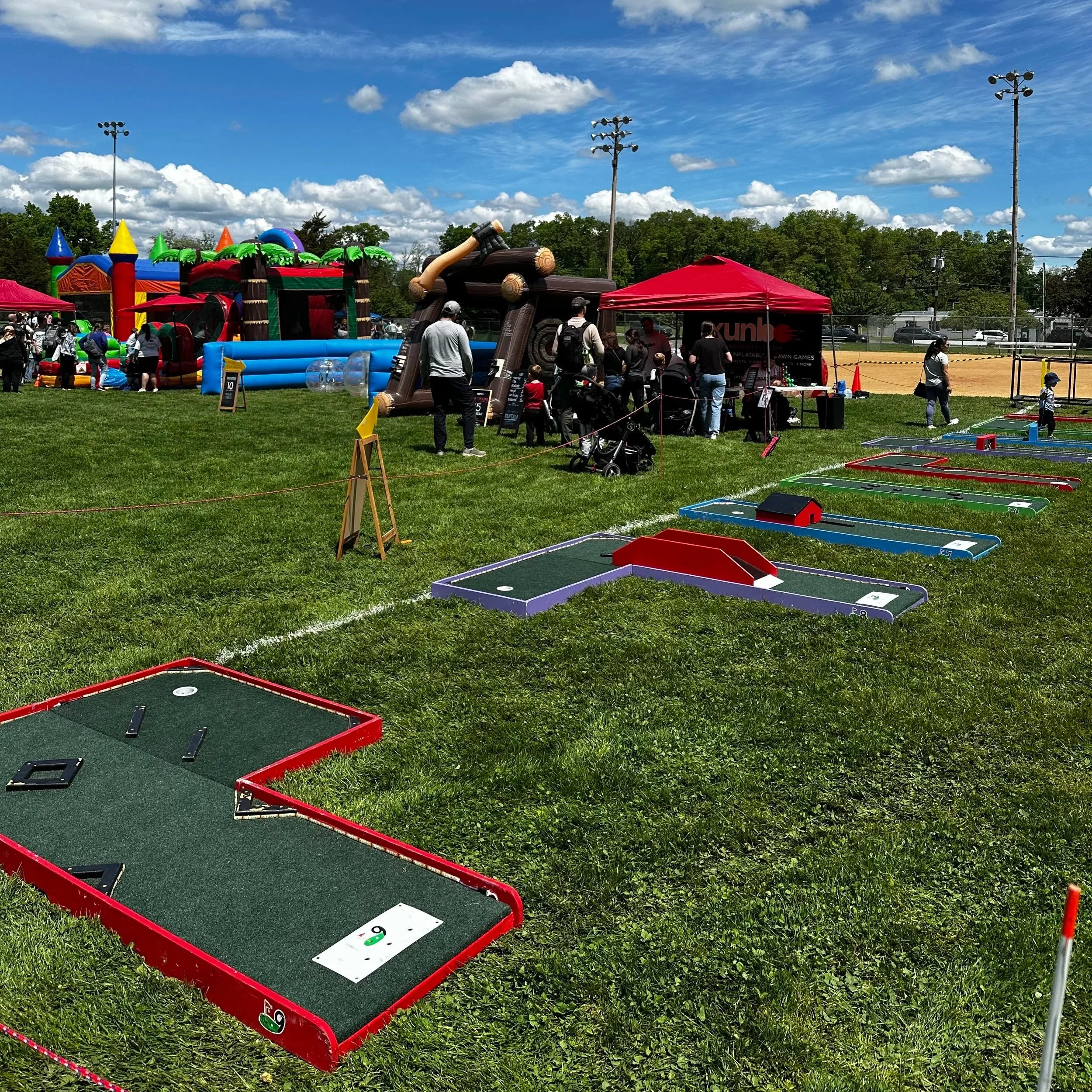Local north jersey park funzone setup with mini golf and inflatables