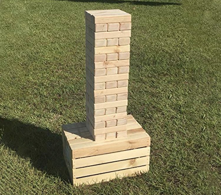 Giant Jenga tower game at a party event
