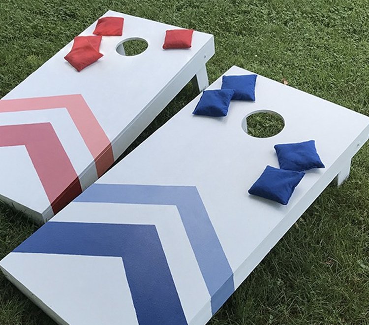 Cornhole lawn game set up for a party rental event