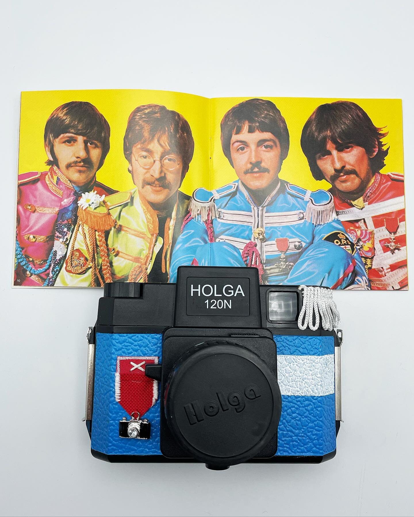 Introducing Sgt. Peppers Lonely Hearts Club Band inspired custom Holga! 
🔵🎶🟡
I had this really cool commission request that took me a bit longer than I planned to get it together, but here it is! I&rsquo;ve been custom painting (and modifying) Hol