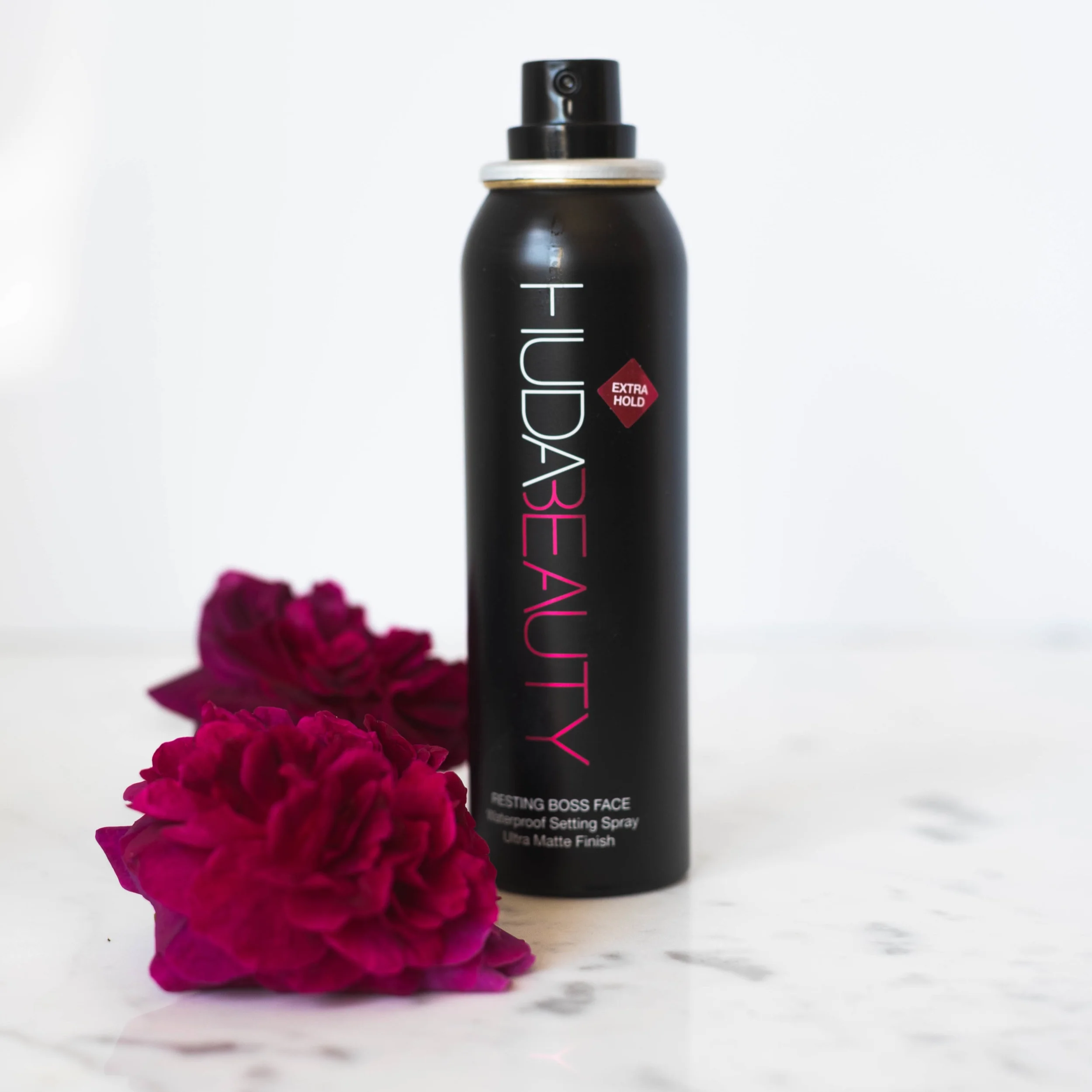 huda beauty setting spray