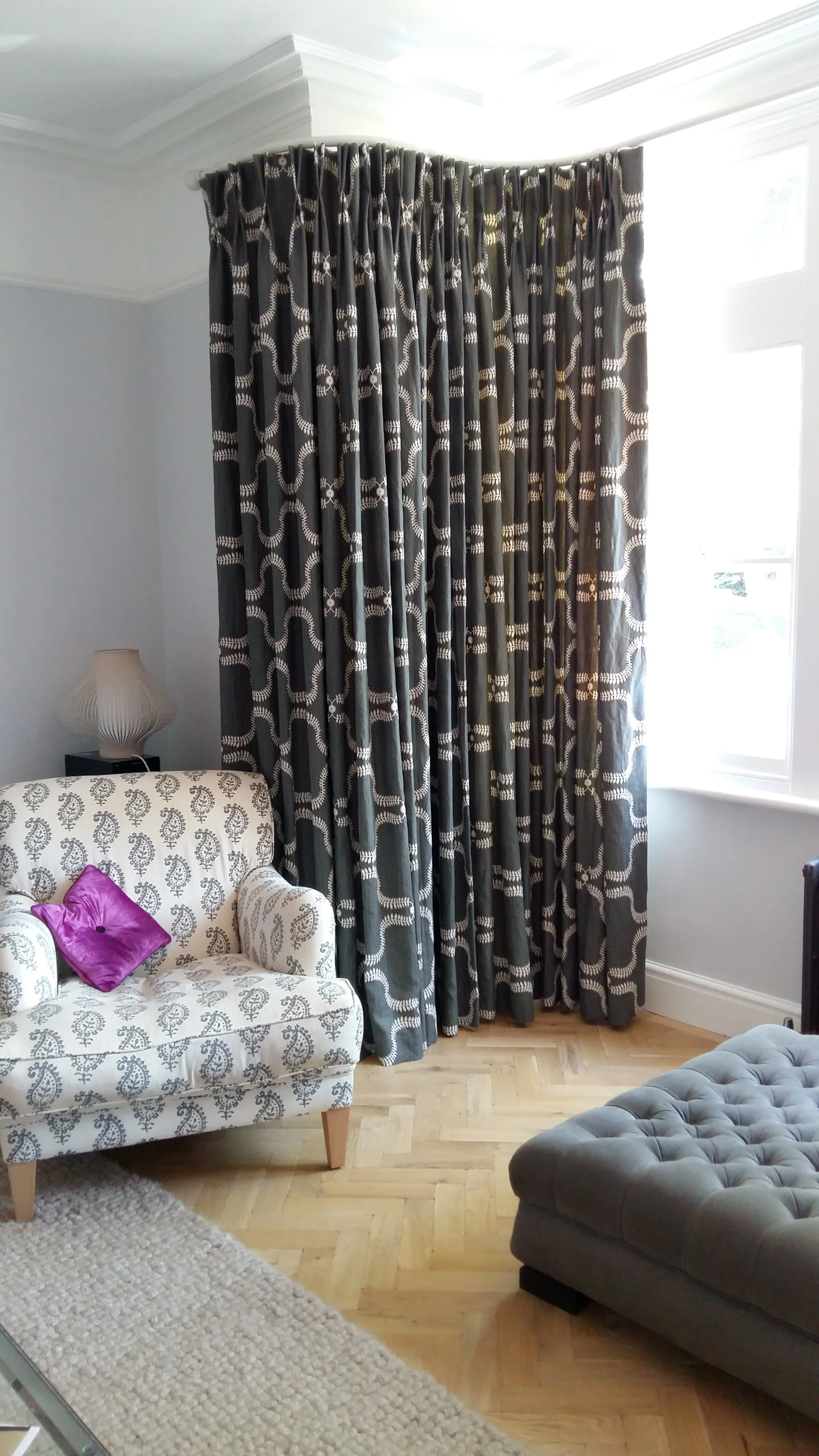 Made to measure bent track with curtains