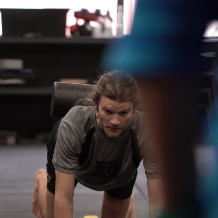 Abe Winterbeard moving pain free in gym studio.png