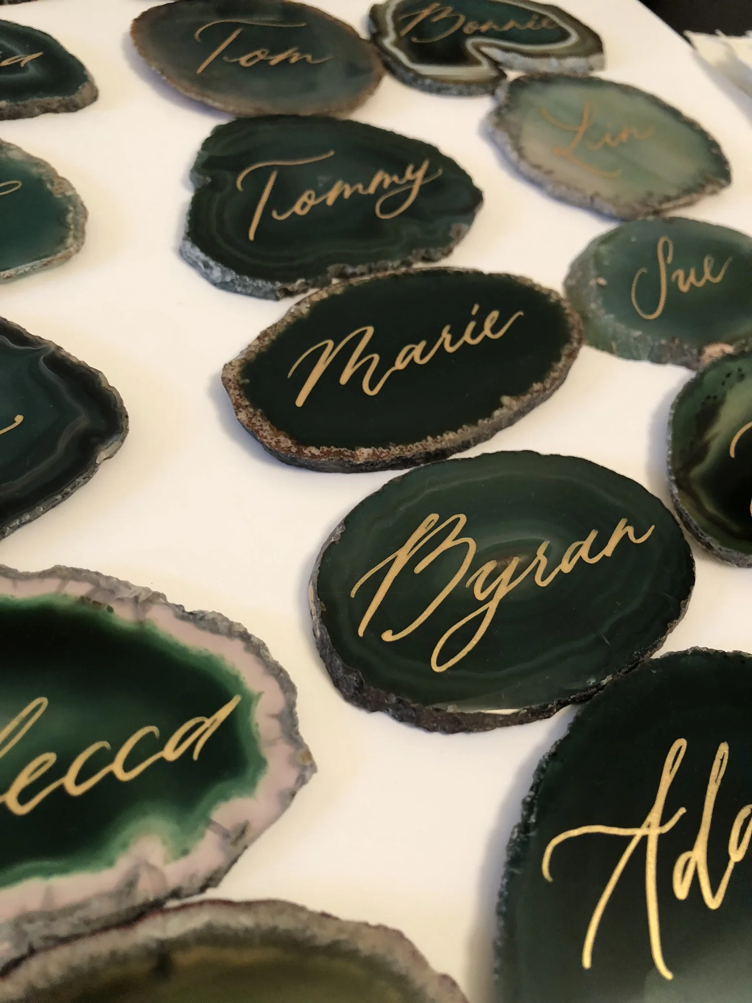 Green agate slice with gold calligraphy