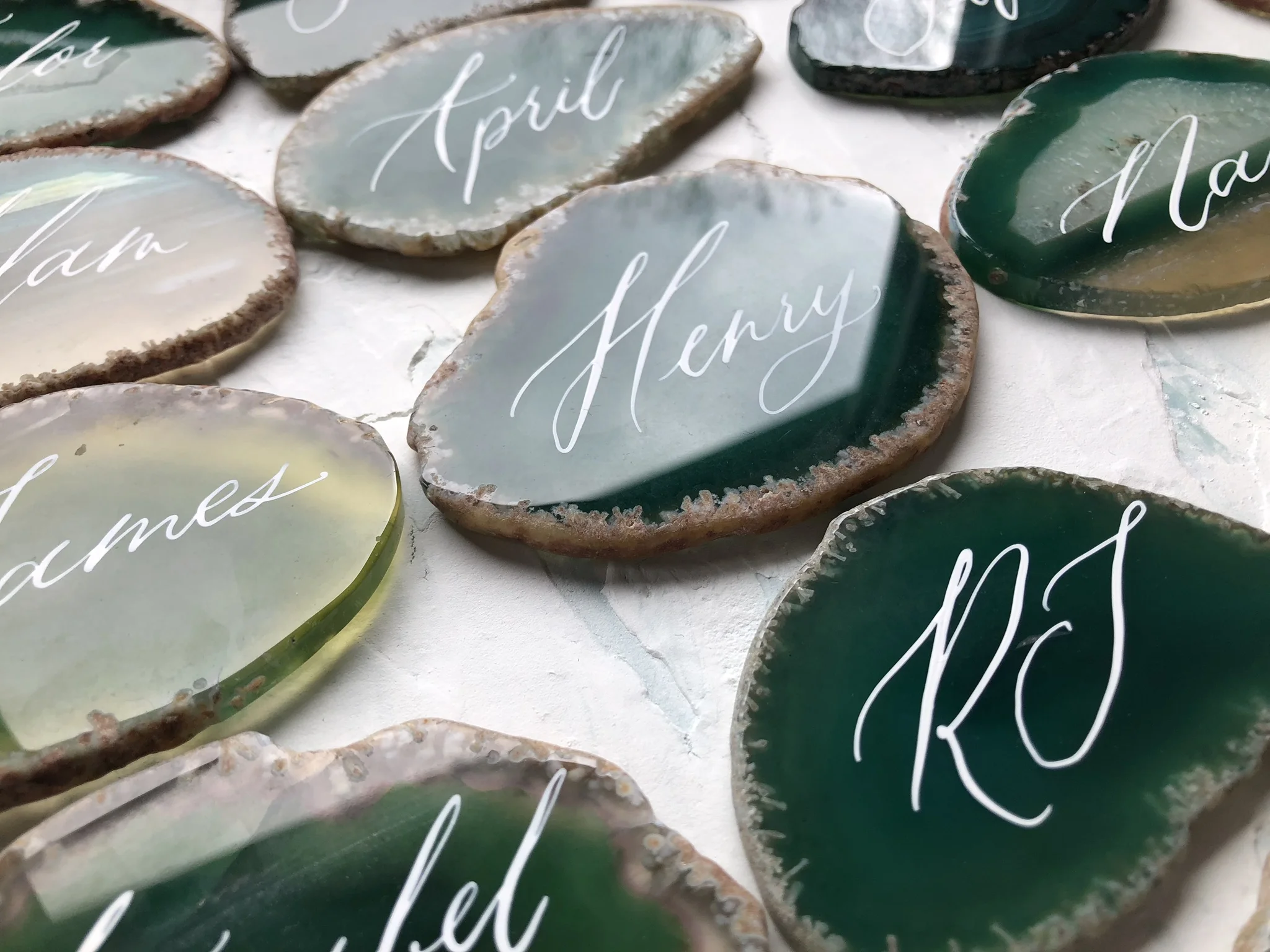 White calligraphy on green agate UK