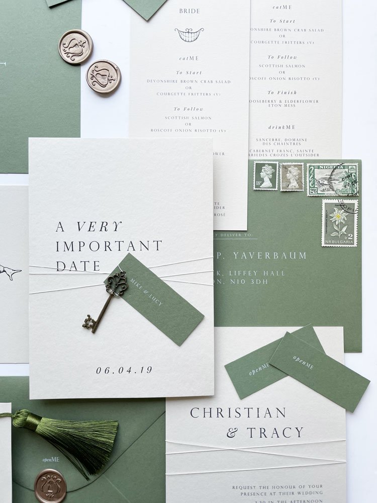 cream and green wedding invitation