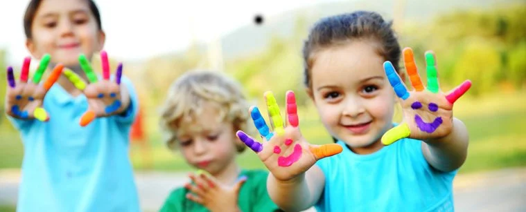 children with paint on hands - Pro Health Therapy Rooms.jpg