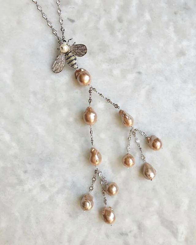 An eclectic combination of styles and influences, mixing pearls and crystals with a bee inspired pendant &ndash; our latest nature inspired necklace will leave a lasting impression on your onlookers!

#Gucci #gucciinspired #fashionjewellery #costumej