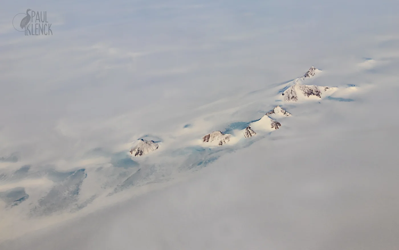 Mountain peaks over glaciers