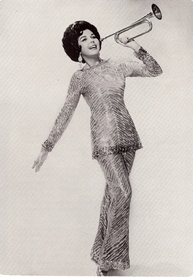 Ann Miller as 'Mame'