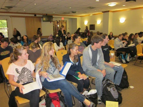 Students wait for poet Eiléan Ní Chuilleanáin's poetry reading to begin, October 13, 2011