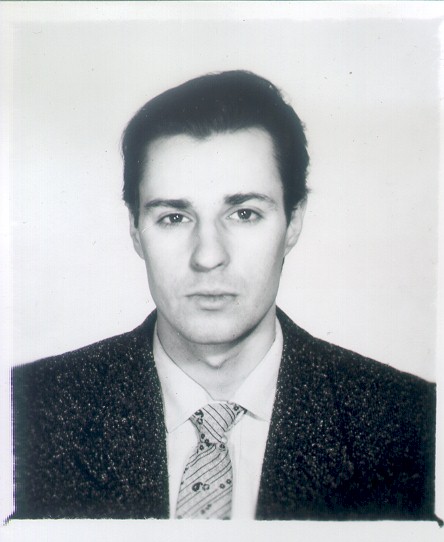 A Russian passport picture. It says "Sashenka" on it, so that's a clue.