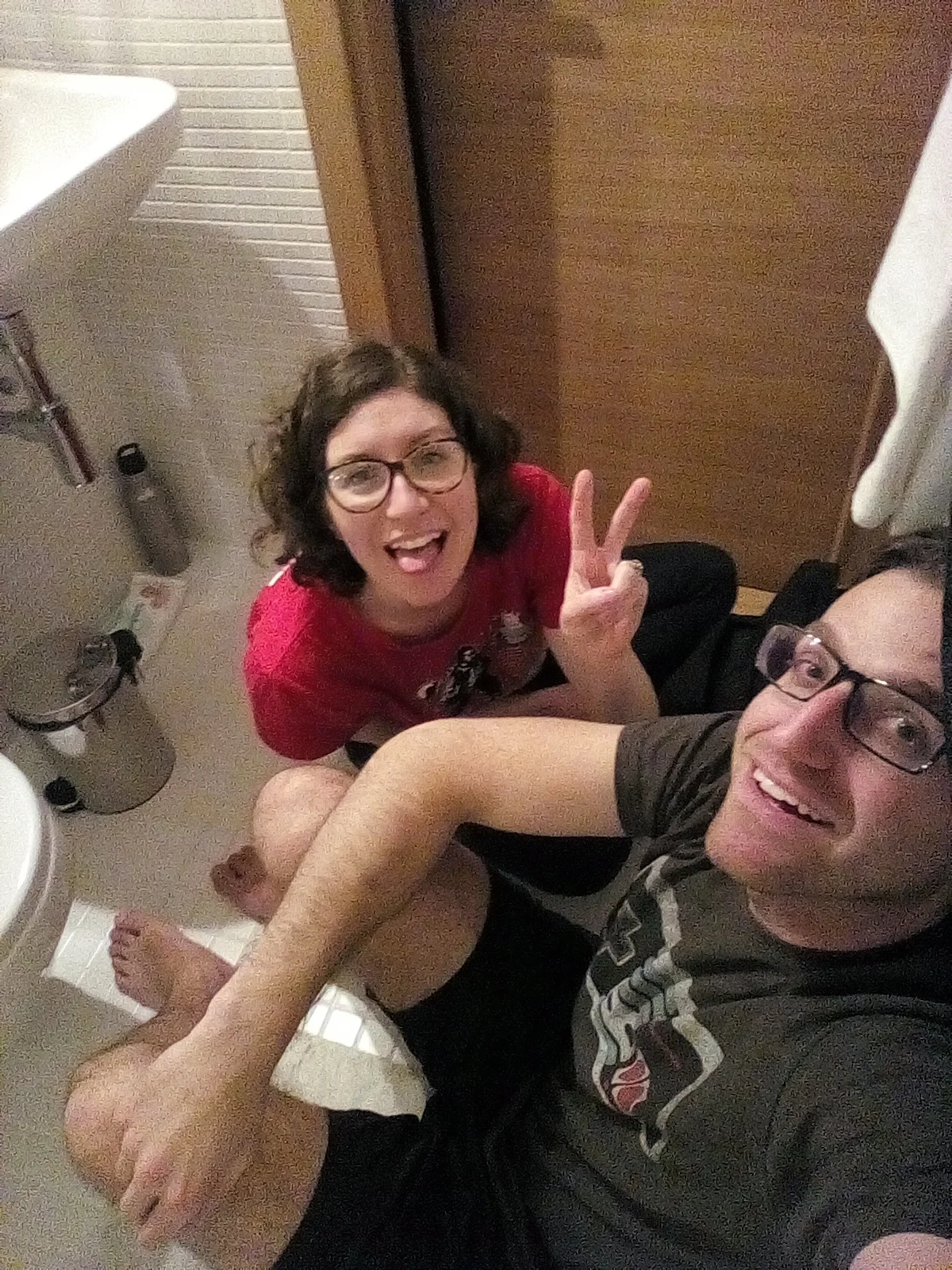 Hiding in the tiniest hotel bathroom ever while waiting for Baby ISO to fall asleep.