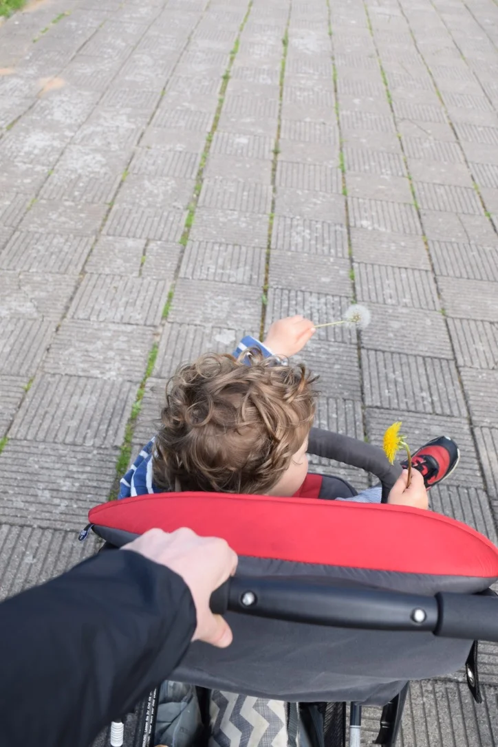 A parent's version of the ever so popular leading pose on Instagram.