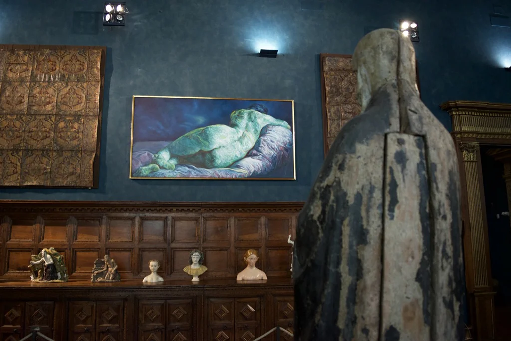 The Virgin Mary enjoys front-row seating for a view of this attractive woman's behind.