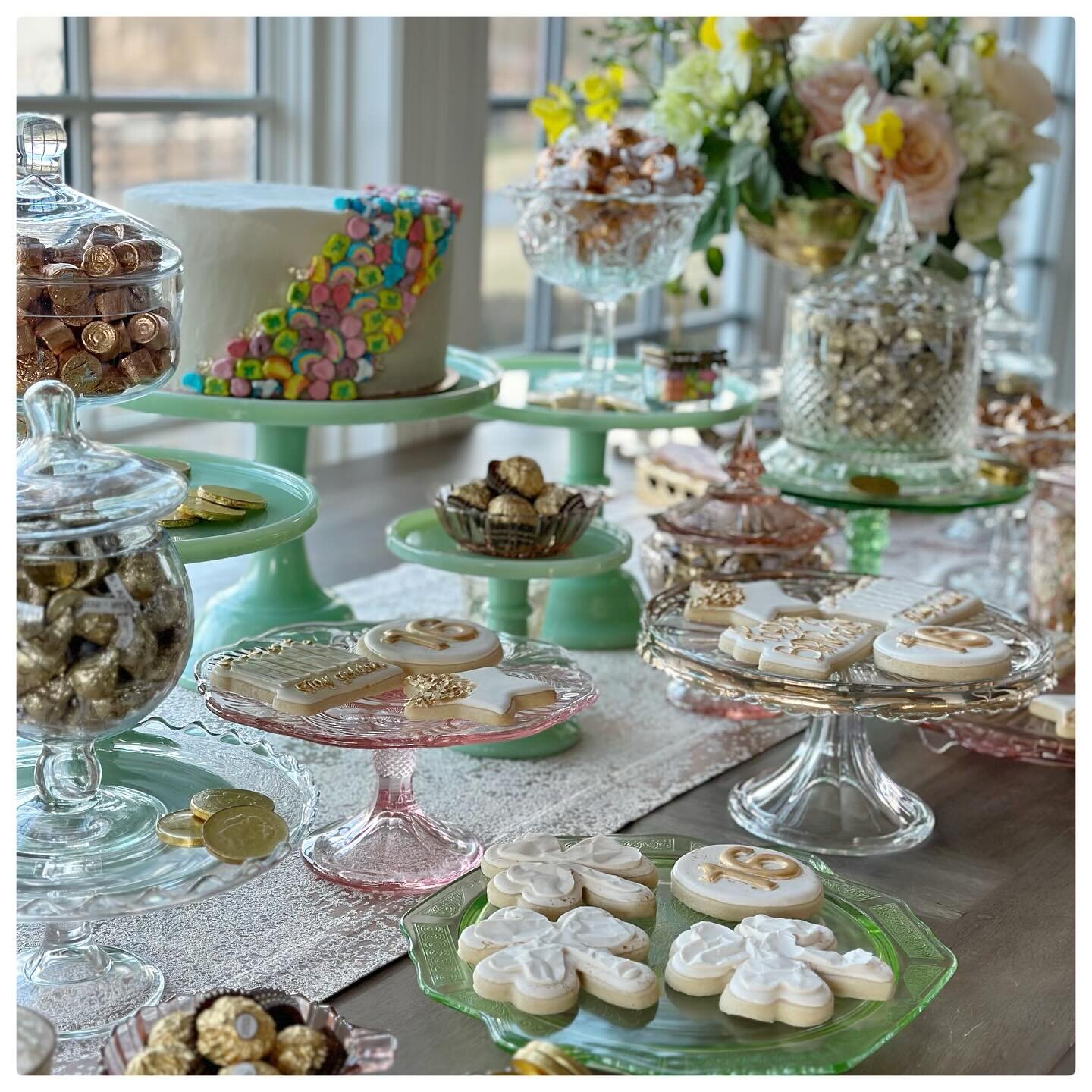 magically delicious 🌈 dessert table for a golden sweet sixteen that fell on st patricks day. epic cake and cookie suite by @peace_love_cookies_llc #luckycharms #magicallydelicious #stpatricksday #sweetsixteen #goldenbirthday #eventstyling #elliestyl