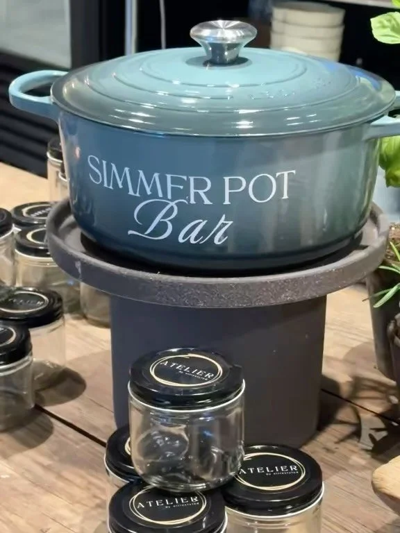 we designed our favorite activation for the the season&hellip; a simmer pot bar. with suggested recipes and intentions, we set out an array of herbs and fruit, floral and spices. guests are invited to fill a jar with a mix of these ingredients to cre