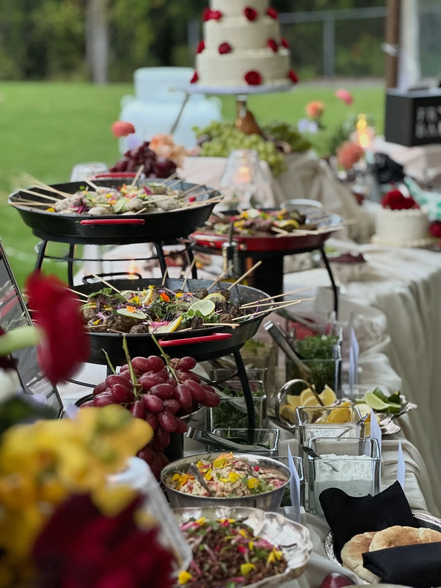 gorgeous mediterranean food station by @jordansfoodofdistinction kofta station, chargrilled lamb, cumin and sumac spiced chicken, chickpea and herb…with all the fixings, couscous, tabbouleh and baba…the colors and flavors hit just right
