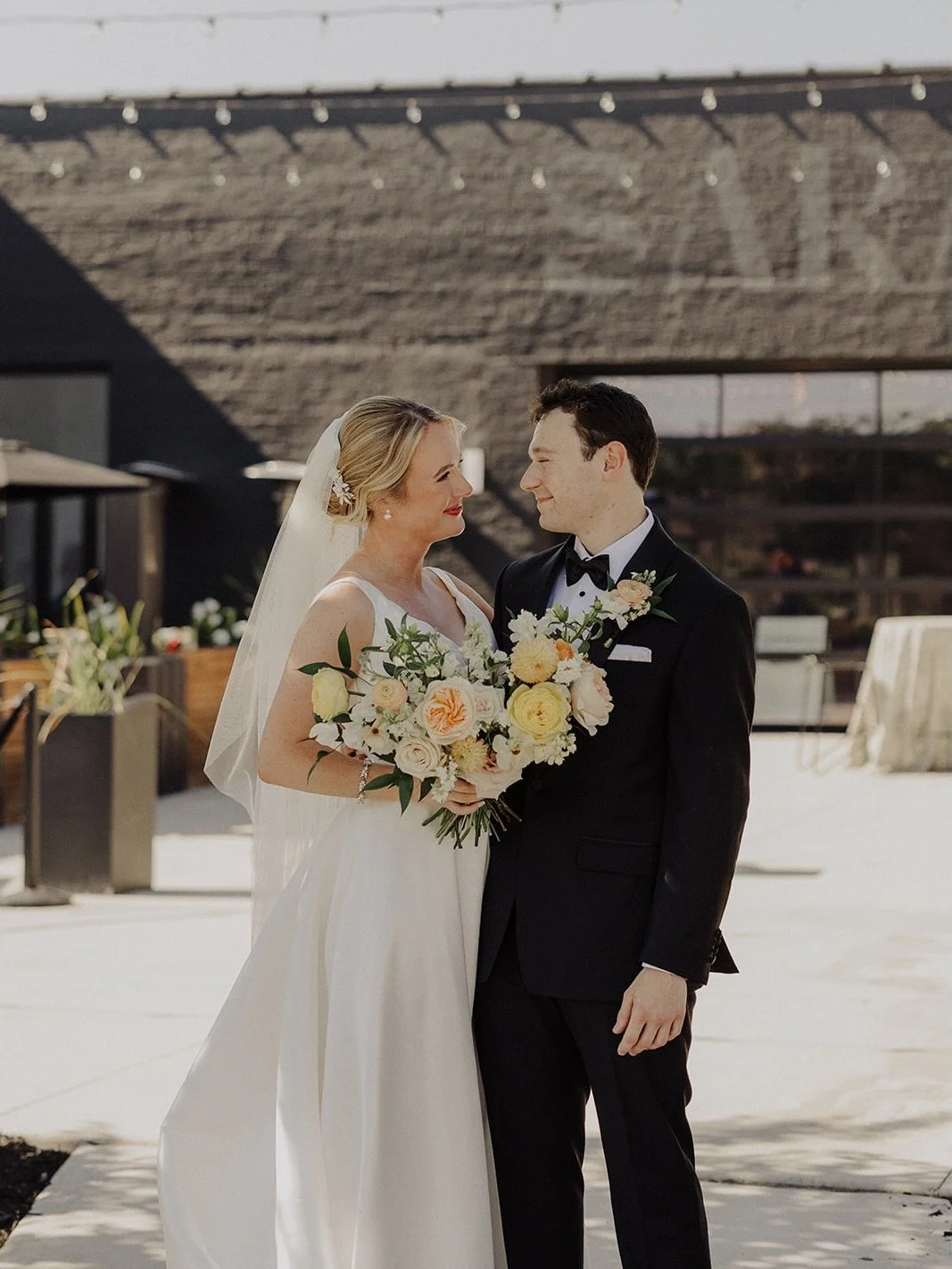 a look back at allie + luke&rsquo;s wedding at sarabande last spring. 

we were blessed with a beautiful day and were able to utilize the outdoor space for cocktails. the garage doors opened up to a handsome space with wood accents and a polished ind