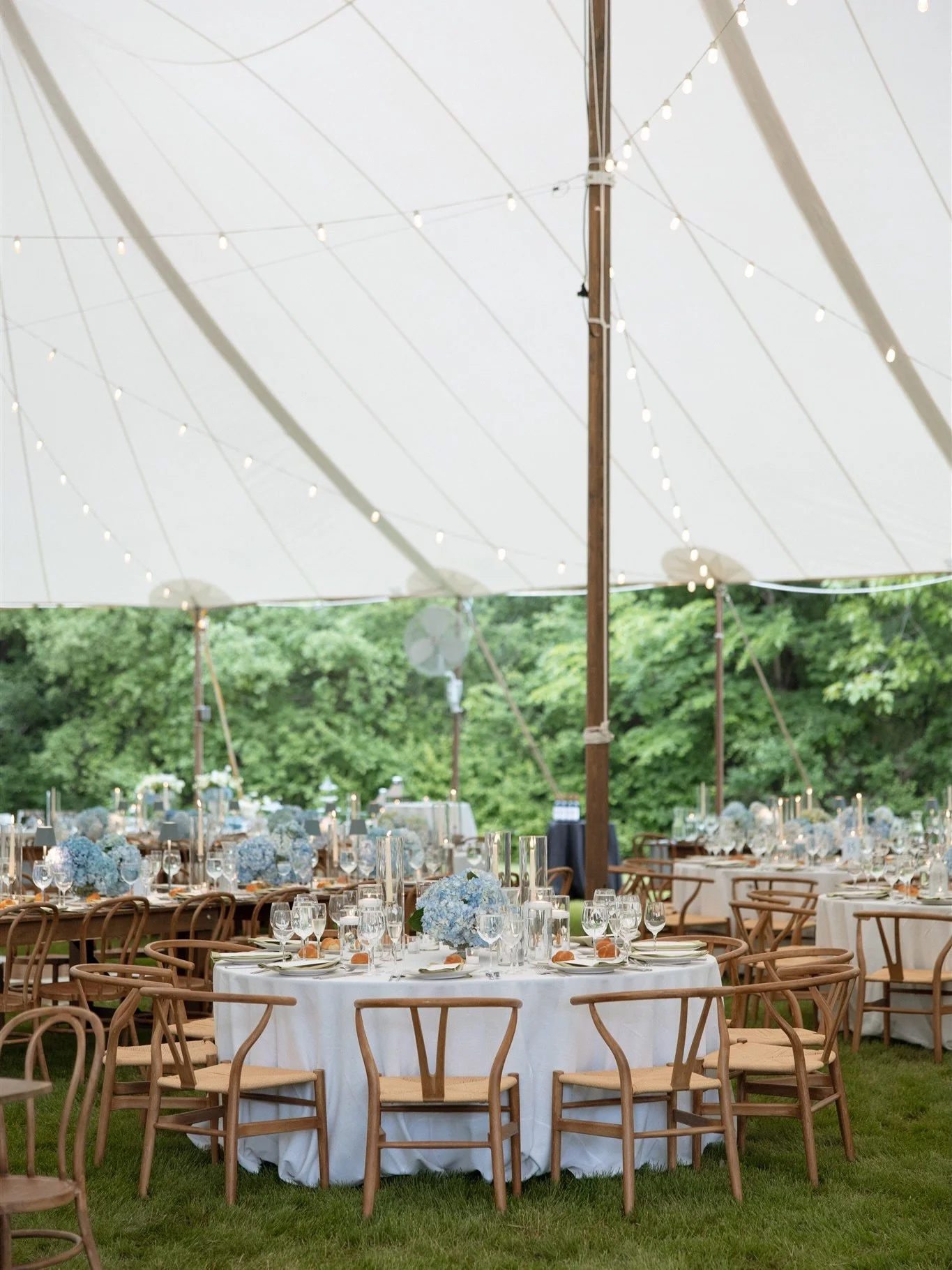 a sailcloth tent in the backyard, blue hydrangeas everywhere, butter yellow accents, and tables set for a long summer dinner&hellip;

one of our favorite details was the way the palette carried throughout the entire experience. the blue hydrangeas ec