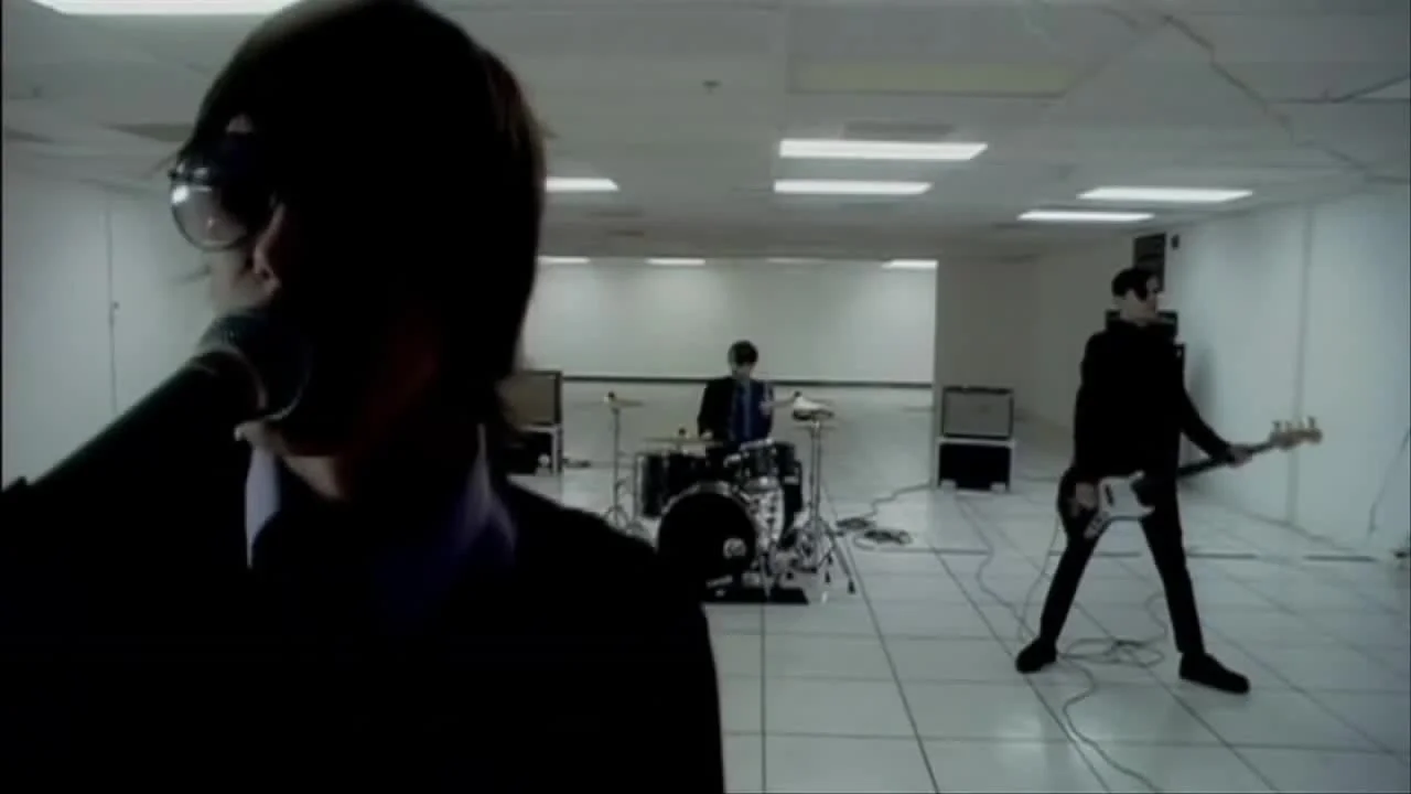 Still from the Obstacle 1 music video off Turn on the Bright Lights