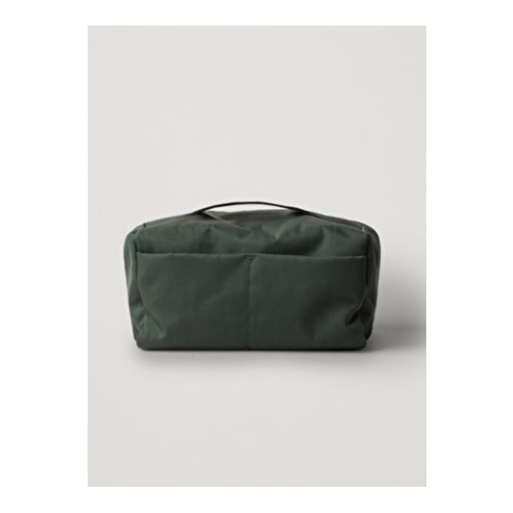 Padded wash bag by COS £45