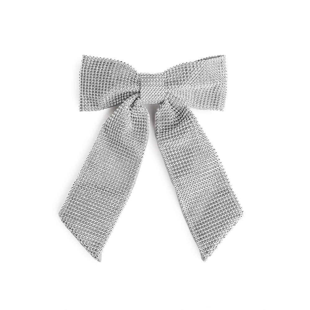 Silver hair bow £19, Arket