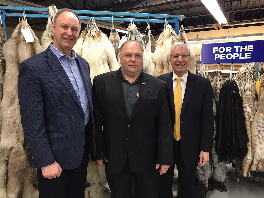 Robin Horwath of the Ontario Fur Managers Federation (center) stands with Ministers Yakabuski and Fedeli. (Photo | OFMF Facebook)