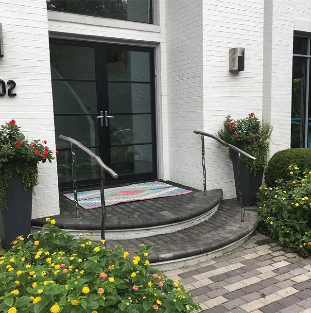 A set of twisted stainless steel railings in Potomac #onsite #tigwelding #installation #designbuild #worktruck 🗜