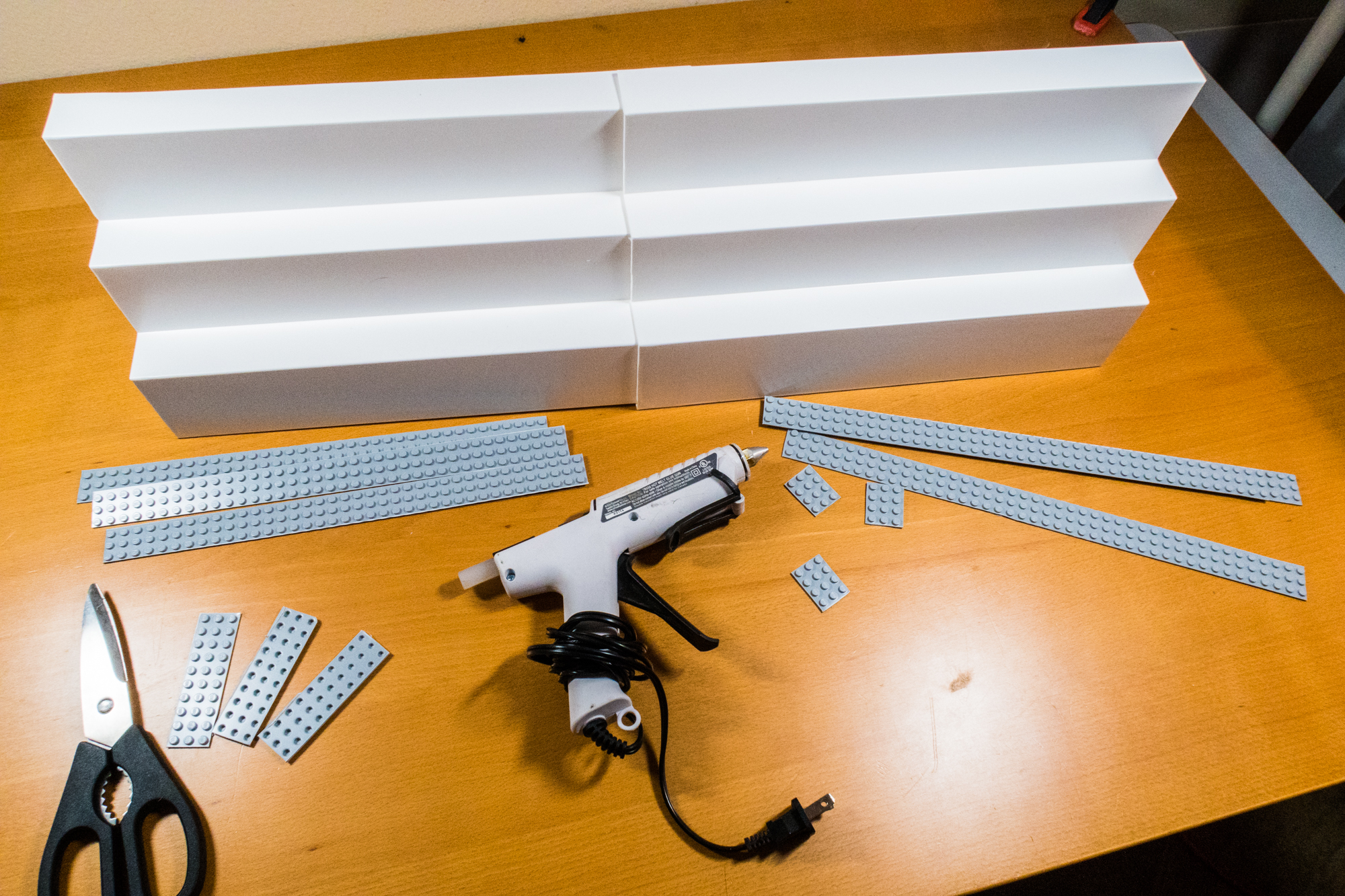 Out comes the hot glue gun! Note that I cut the long strips with a straight edge and X-acto knife and then trimmed them to length with some kitchen shears.