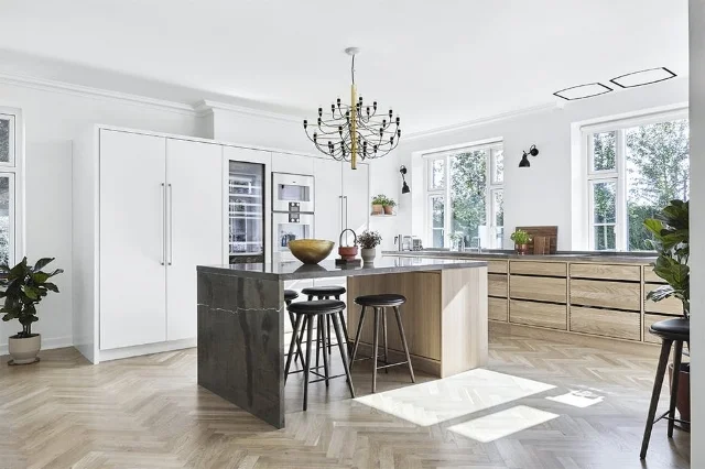 The kitchen is full of design details. Note how the space between the drawers are is used to open them. 