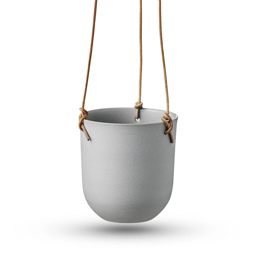 Grey hanging planter with leather hangings