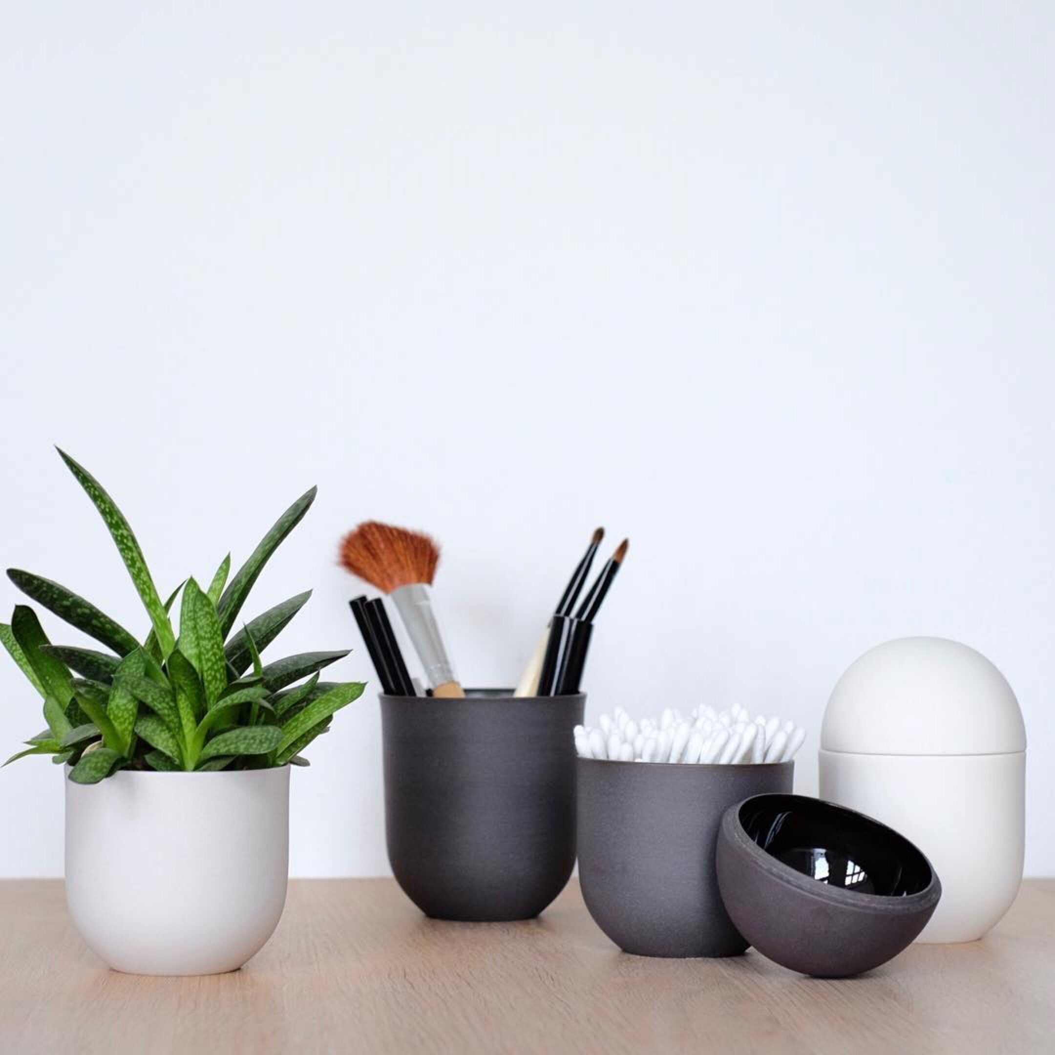 ceramic storage jars in white grey and black