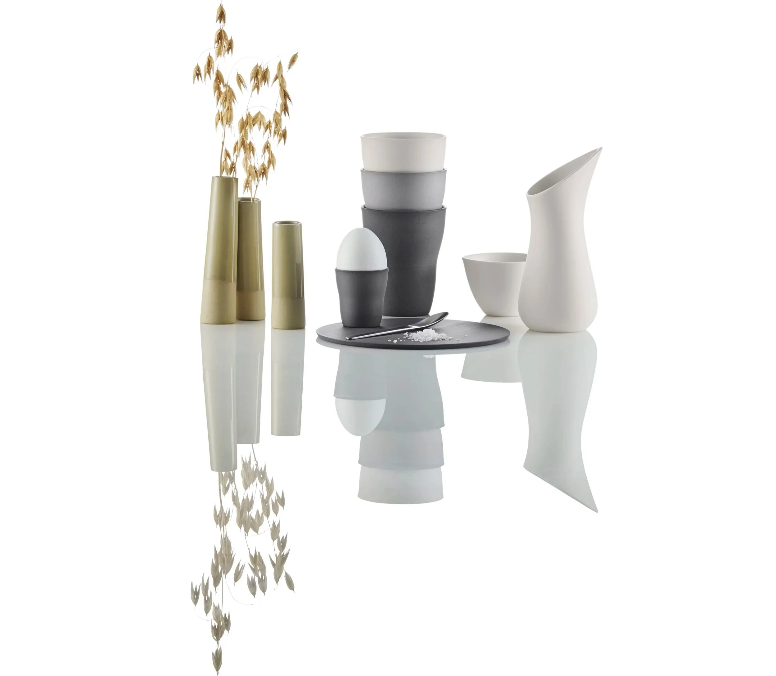Ditte Fischer handcrafted porcelain vases, bowls and tableware in muted Scandinavian colours.