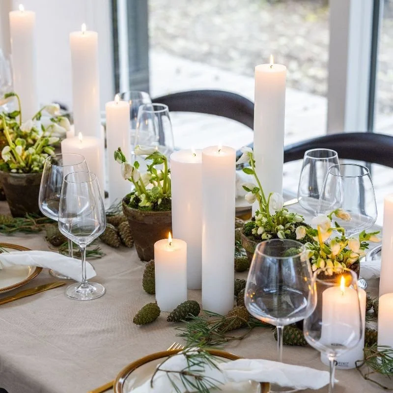 Quality handmade pillar candles on Scandinavian table