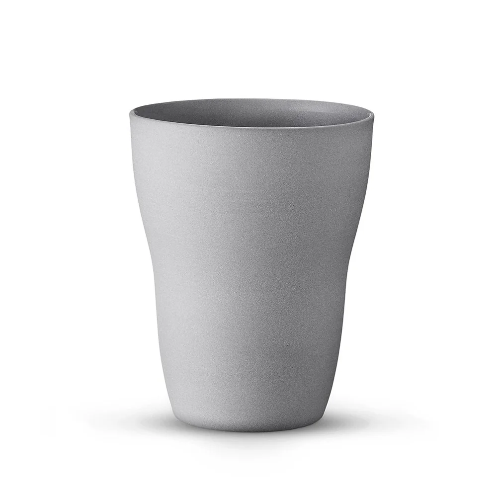 Grey Scandinavian ceramic mug with soft unglazed exterior, glazed interior