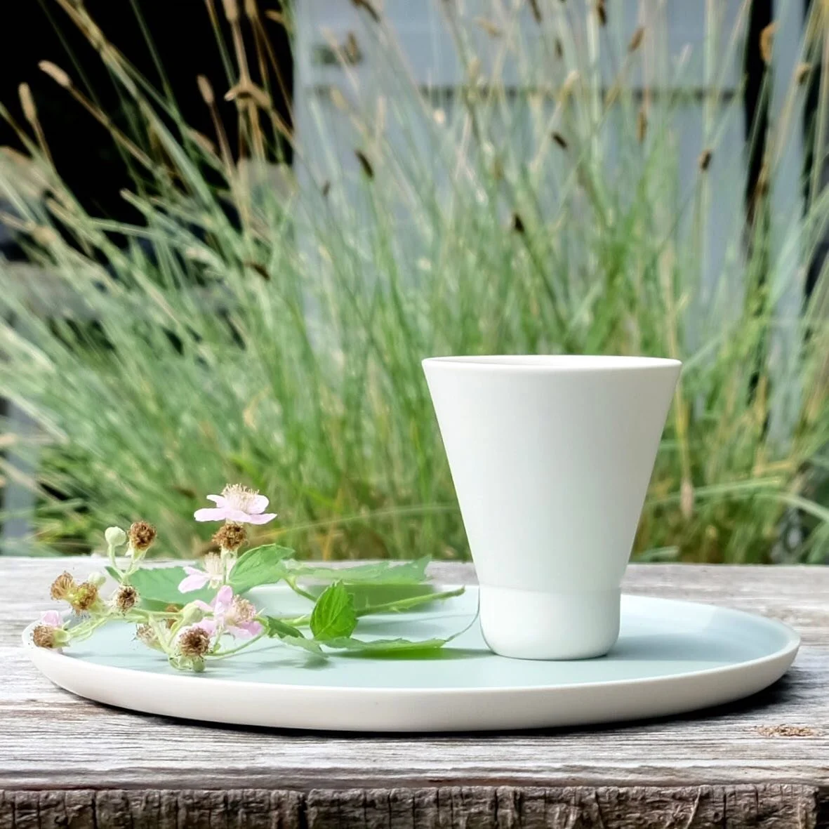 Handmade mug on spring table