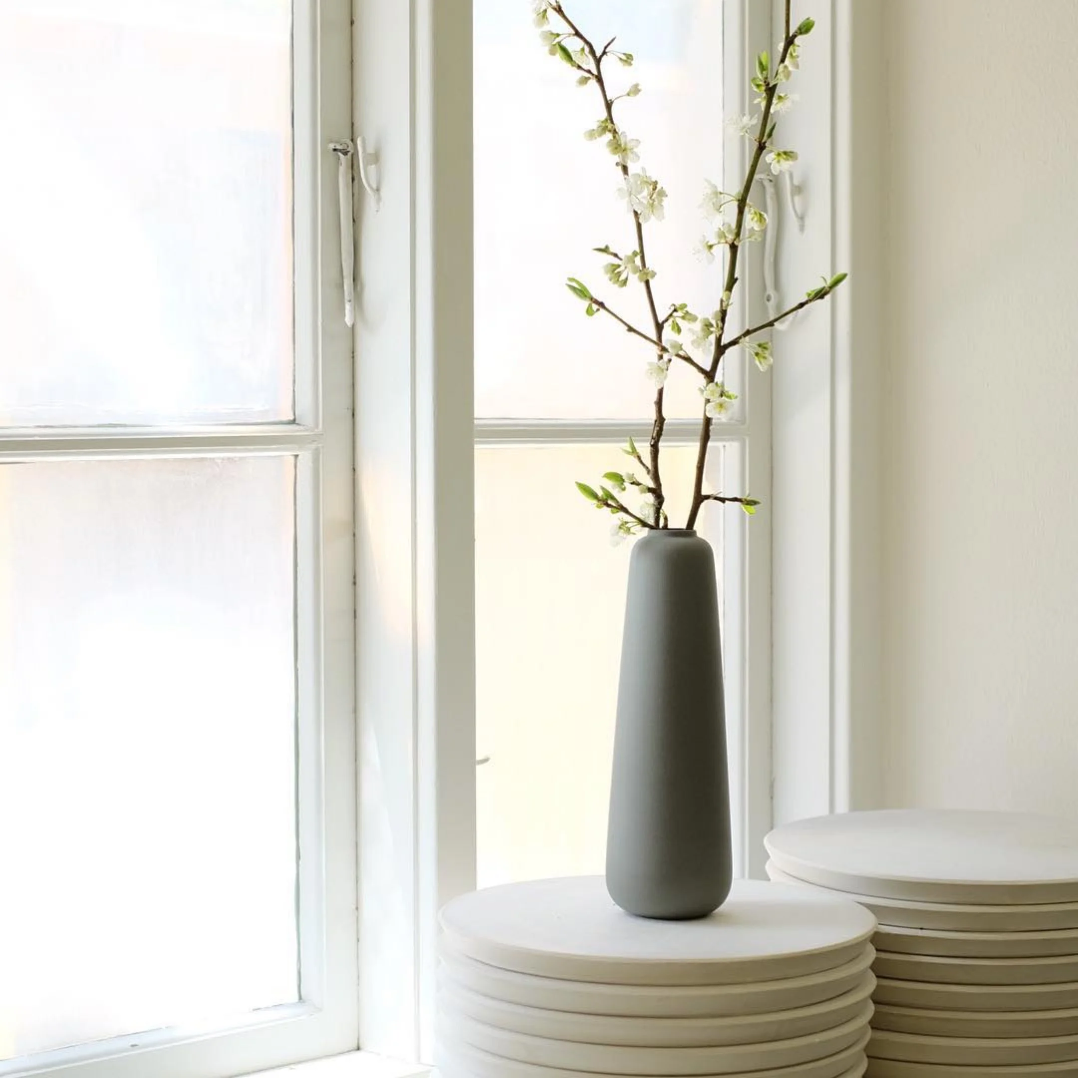 Handmade Scandinavian ceramic vase with matte finish and simple form