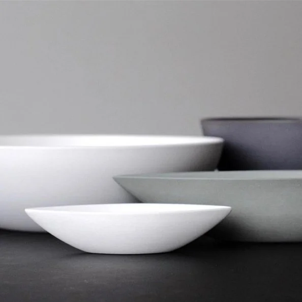 Handmade ceramic Boat Bowls in white, grey and charcoal, arranged together to show their sculptural forms