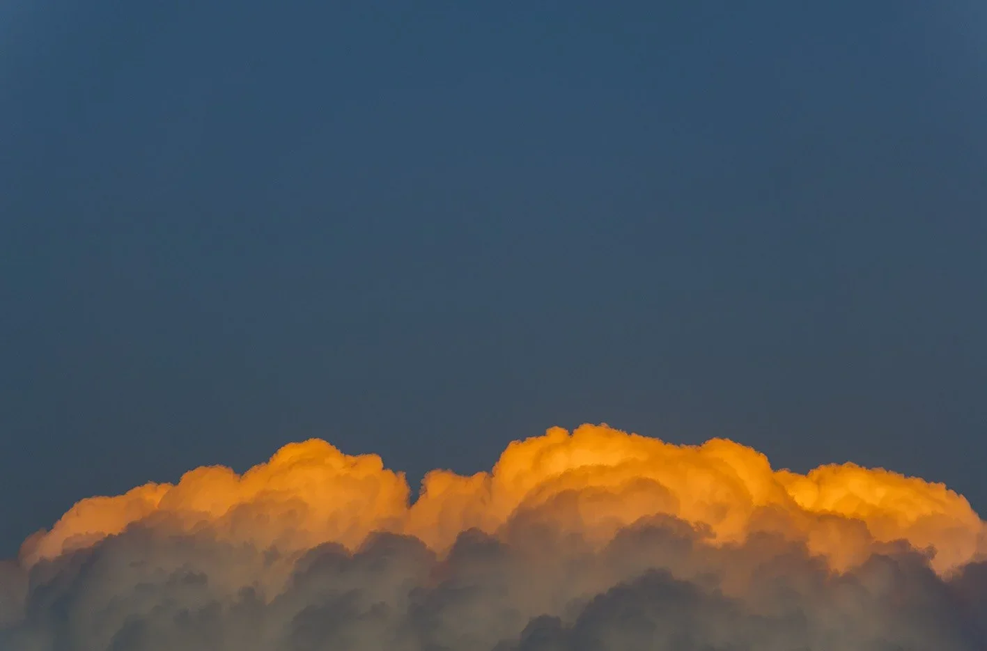 NandaNasser_Aglow+in+the+heavens_59x88cm_photography+on+cotton+rag_framed+in+wood+with+art+glass_edition+1of7.jpg.webp